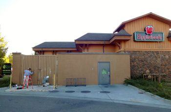 Timmins painting employees painting Applebee's in Sonoma County