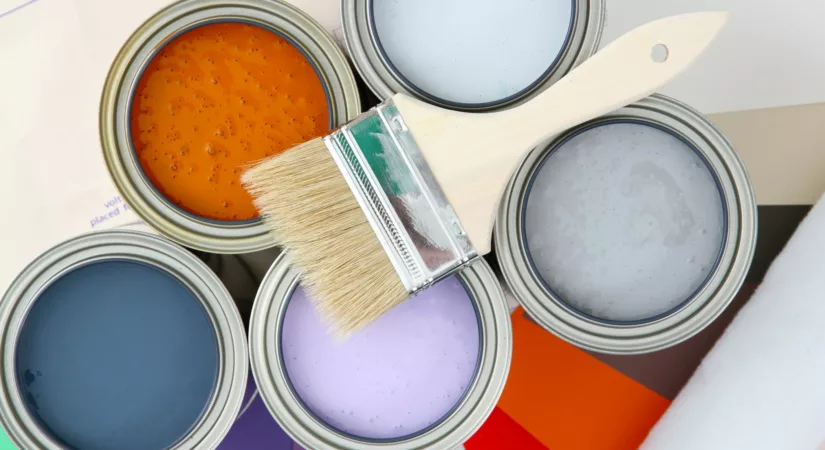 Paint cans ready to be used on white background