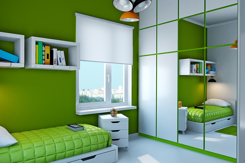 Student bedroom with large window painted a bold green