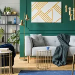 A modern living room with a dark green accent wall, showing the concept of how to choose living room accent wall colors